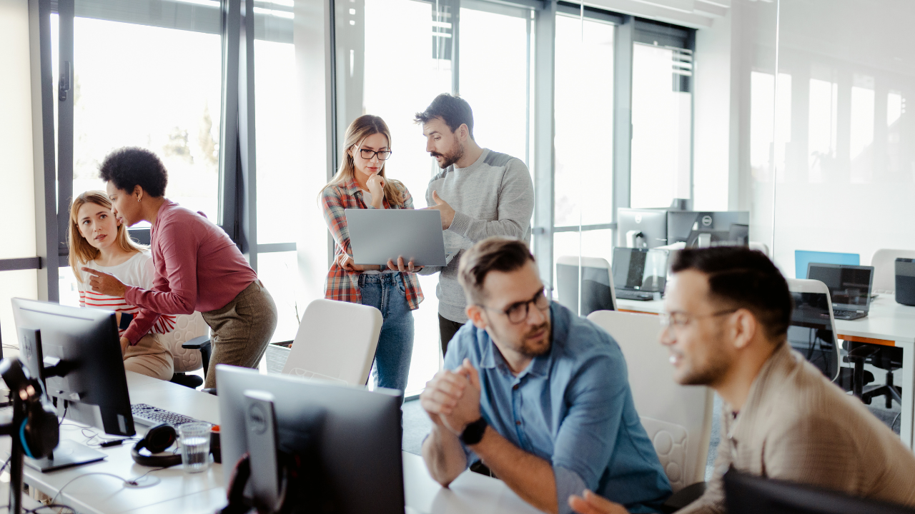 Group meeting around computers