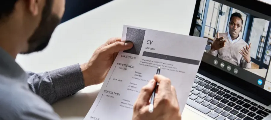 Man looking at CV