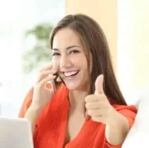 Recruitment Consultant on phone smiling